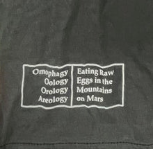 Load image into Gallery viewer, Vintage T-Shirt: Jan Peacock 2011 (Eating Raw Eggs In The Mountains On Mars)
